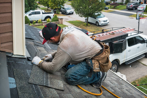 Professional Roofing technician working in East Hampstead, NH